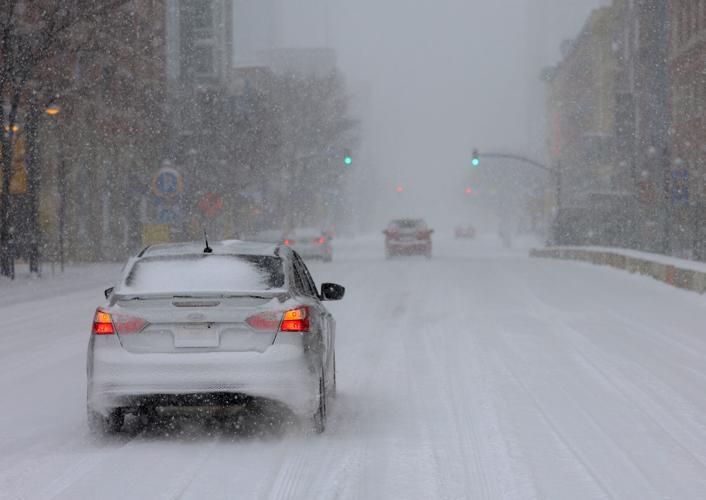 Cars drive on Main Street - Jan. 5, 2025.JPG