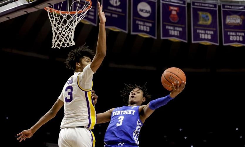 Kentucky guard TyTy Washington Jr. shoots over LSU forward Alex Fudge