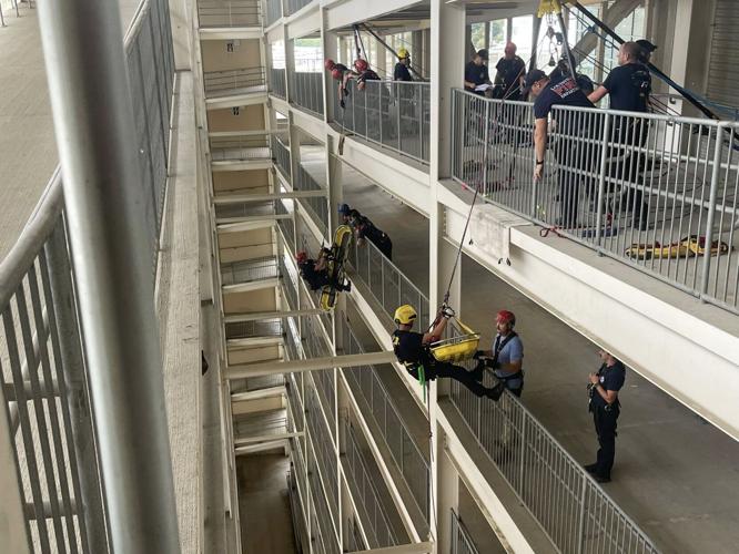 IMAGES | Kentucky Firefighters practice rope rescue on training tower