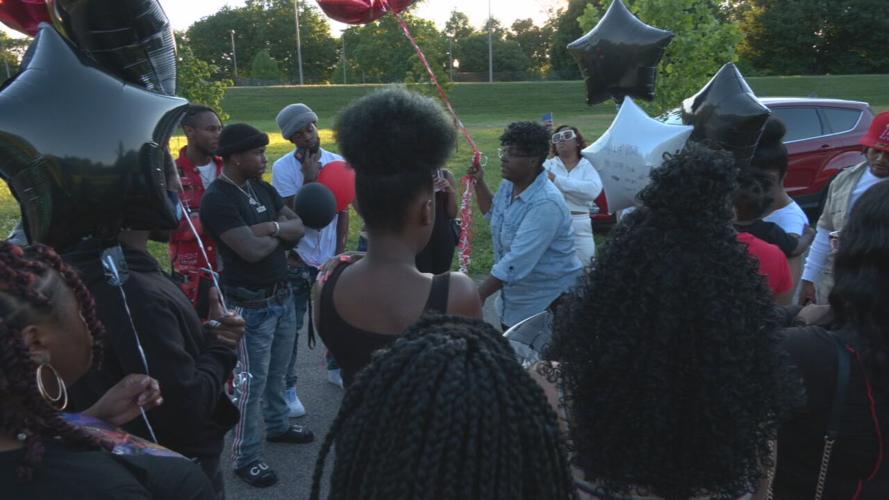 LOGAN HOMICIDE VICTIM BALLOON RELEASE _33878.jpeg