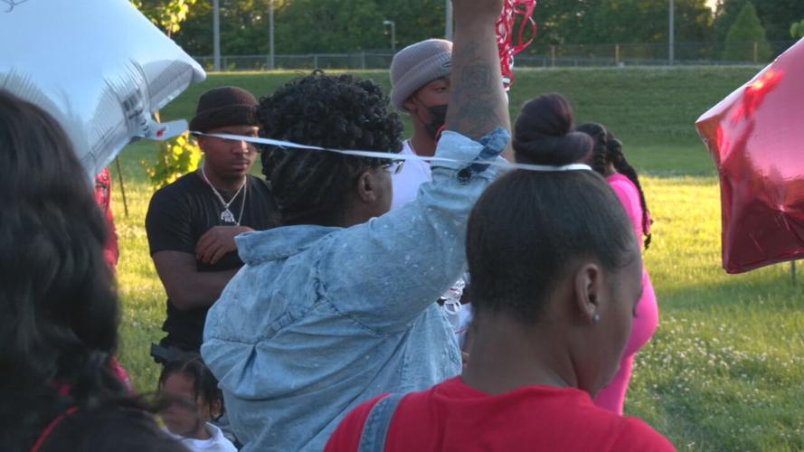 LOGAN HOMICIDE VICTIM BALLOON RELEASE _27562.jpeg