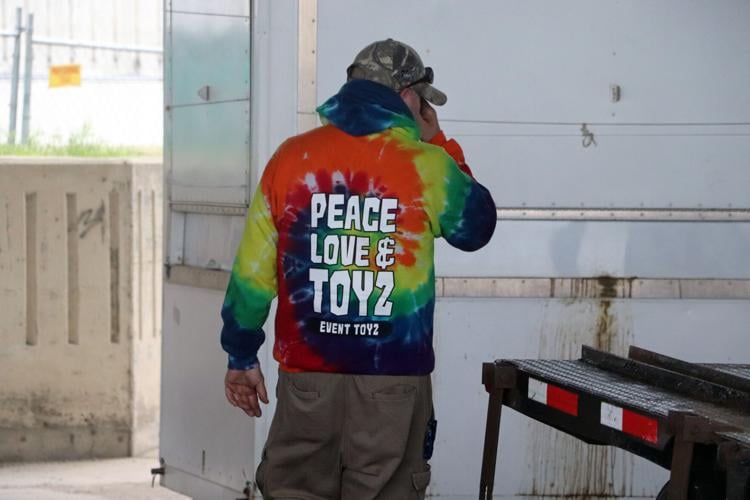Crews set up booths along the Ohio River one day before Thunder Over Louisville 2023