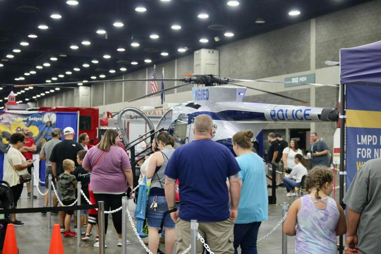 people in line to look at LMPD helicopter.jpg