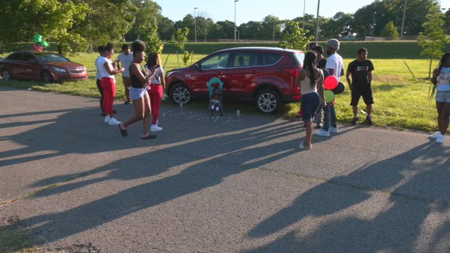 LOGAN HOMICIDE VICTIM BALLOON RELEASE _6412.jpeg