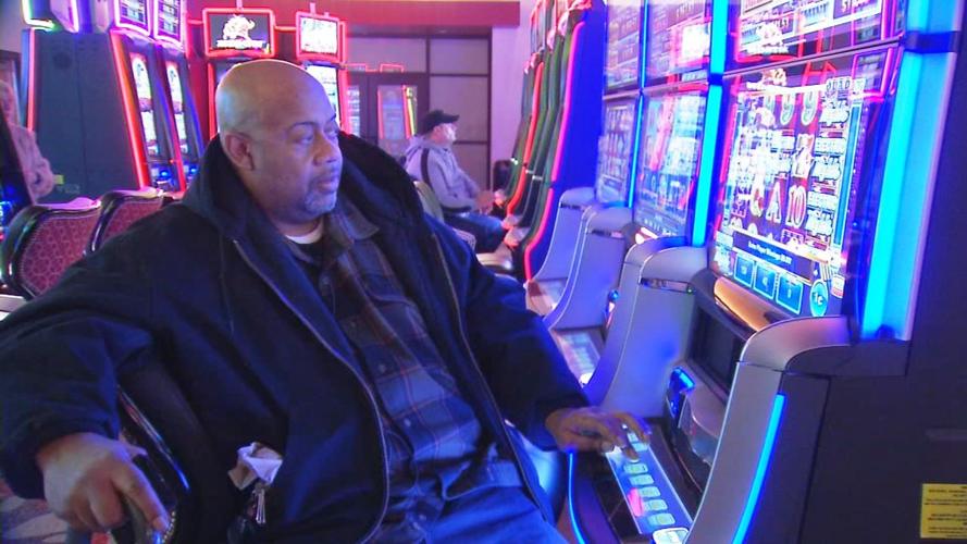 Derby City Gaming player at machine