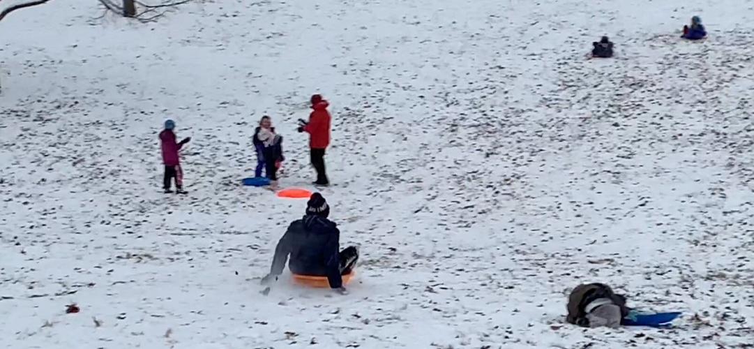 sledding at Tyler Park.jpg