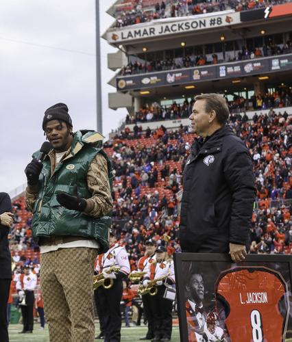 UofL jersey retired in 2023  Lamar jackson, Winter jackets, Fashion