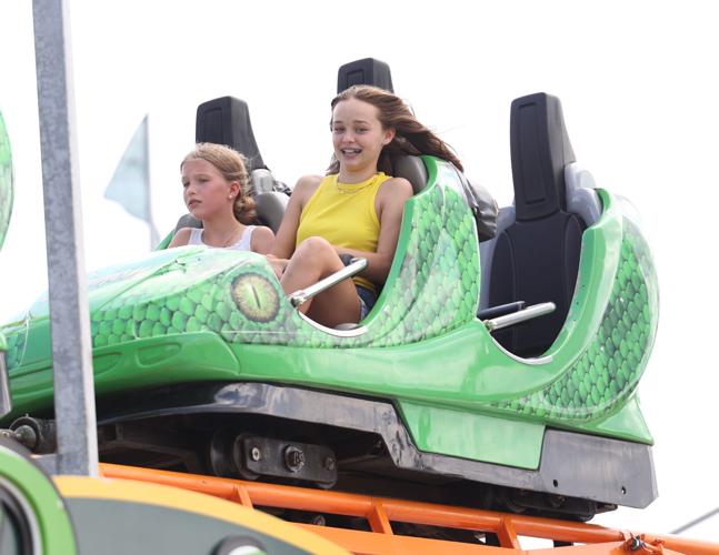 People on a ride at the Midway