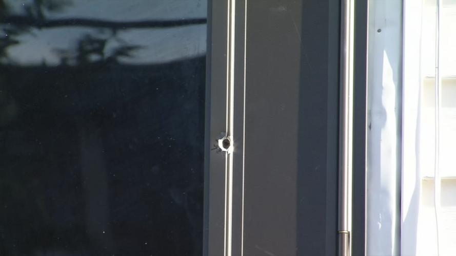 Bullet hole in home after 2-year-old girl hit by stray bullet on Rowan Street - Sept. 26. 2019