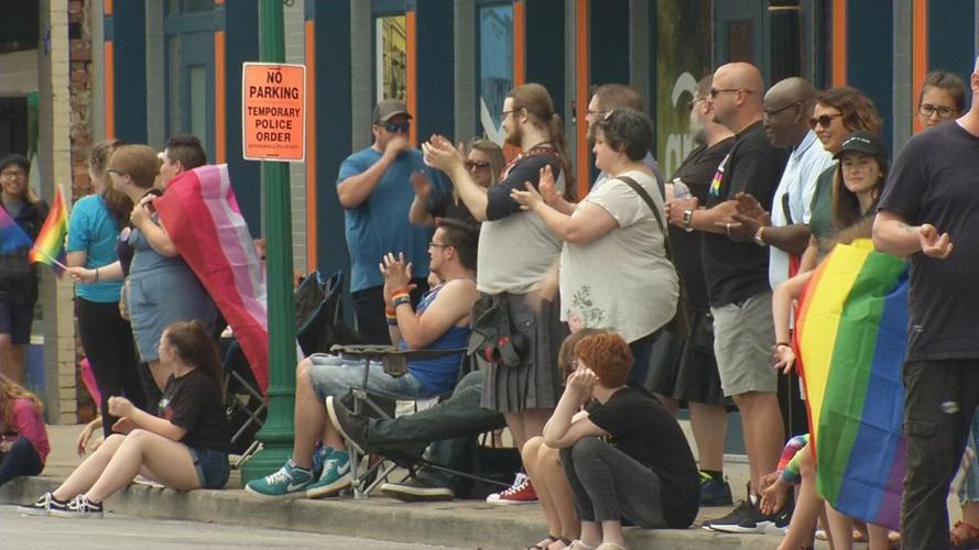 Festivalgoers line the streets for the Southern Indiana Pride Parade