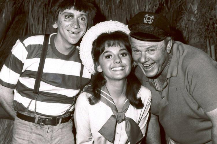 Dawn Wells, center, poses with fellow cast members of "Gilligan's Island," Bob Denver and Alan Hale Jr.