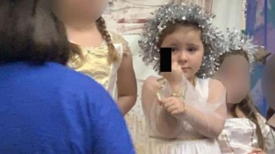 5-year-old with middle finger extended
