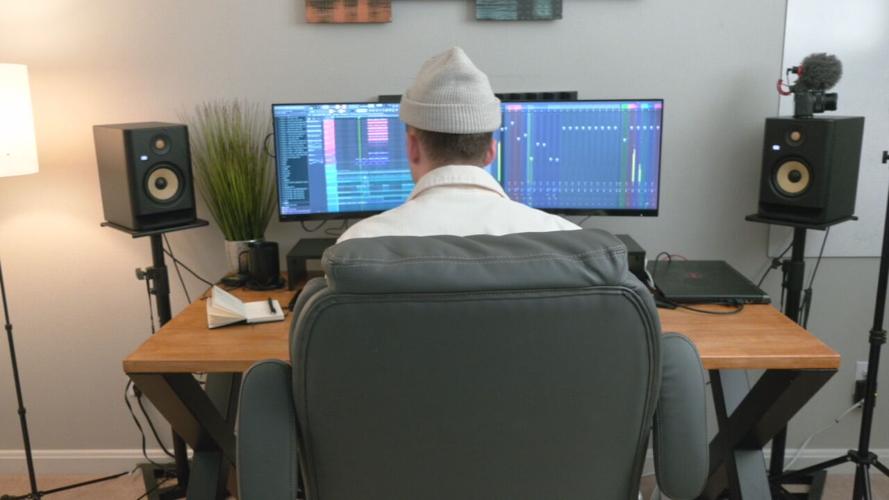 Kyle Hume works at computer