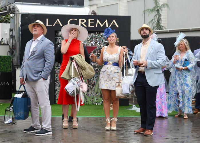 People watch race on video board.JPG