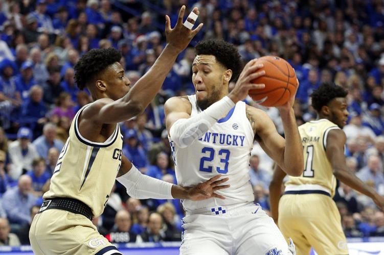 Kentucky's EJ Montgomery, right, looks for an opening on Georgia Tech's Khalid Moore