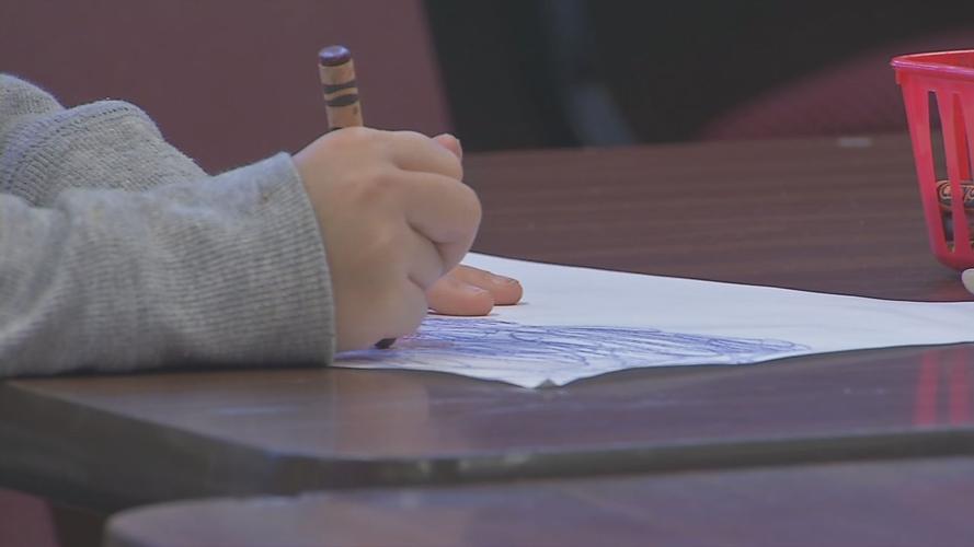 Child with colored pen (generic).jpg