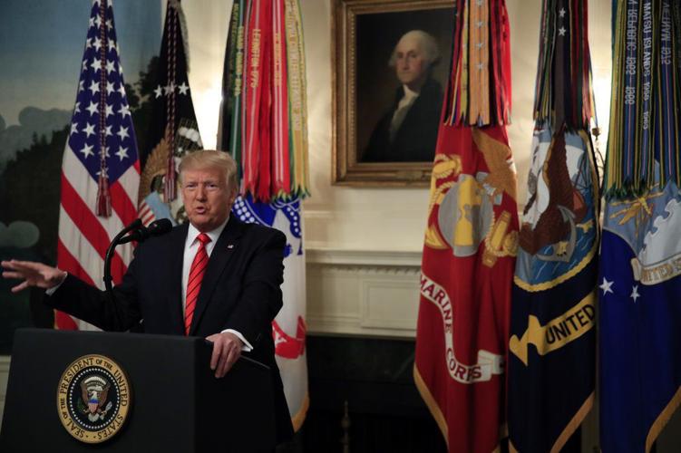 President Donald Trump speaks in the Diplomatic Room of the White House