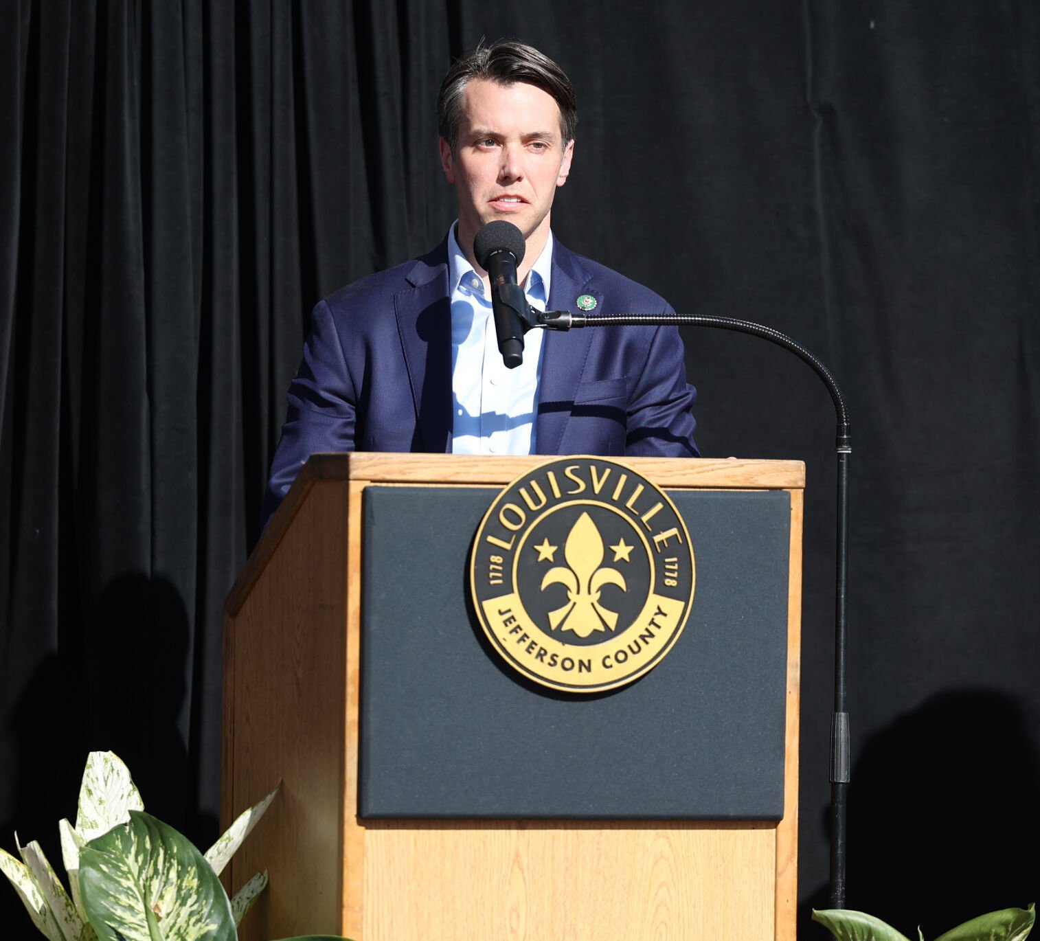 Rep. Morgan McGarvey speaks during vigil.JPG