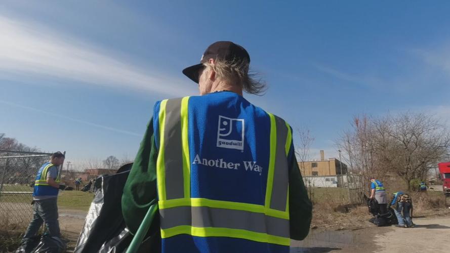 Participants pick up litter as part of the Another Way program
