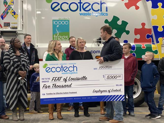 Ecotech presents $5,000 check to Families for Effective Autism Treatment