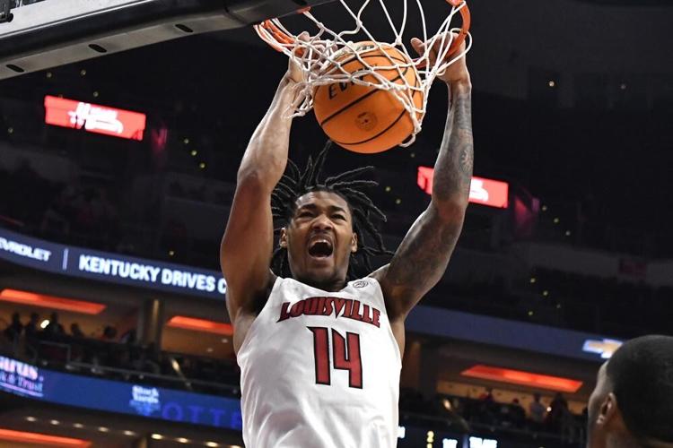 Louisville guard Dre Davis dunks the ball against Southwestern Louisiana.jpeg