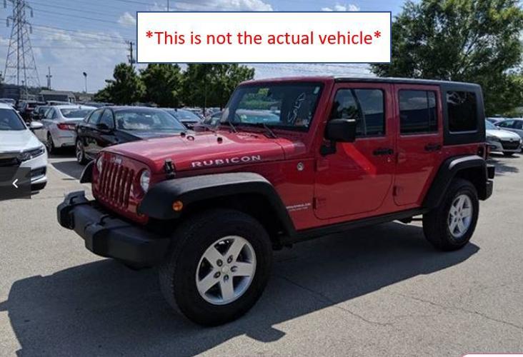 LMPD- HIT AND RUN - RED JEEP - NOT THE VEHICLE - 6-10-19.jpg