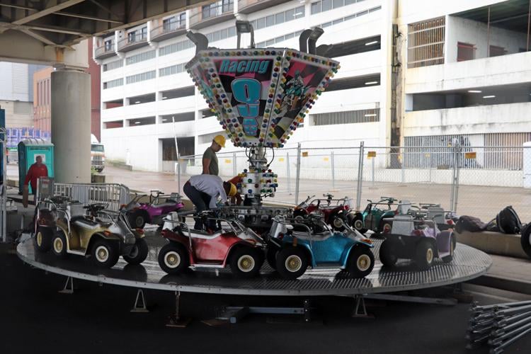 Crews set up booths along the Ohio River one day before Thunder Over Louisville 2023