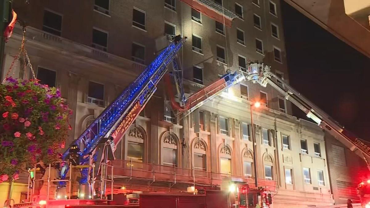 Nobody hurt after scaffolding breaks, leaves workers dangling from side