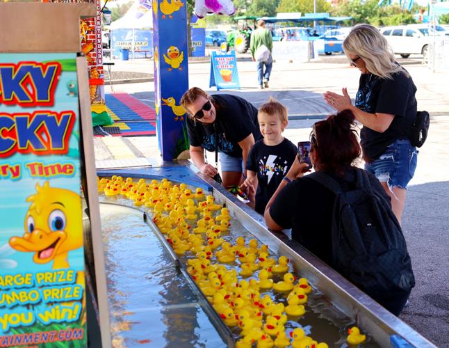 Child cheers during game at Sensory Awareness Day.JPG