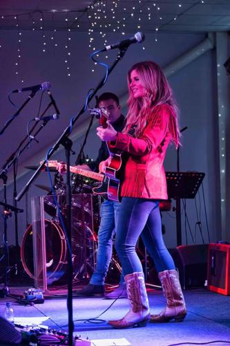 Kinsey Rose performs on stage