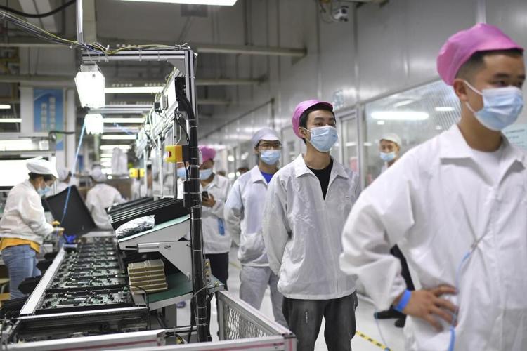 Workers at iPhone factory in China
