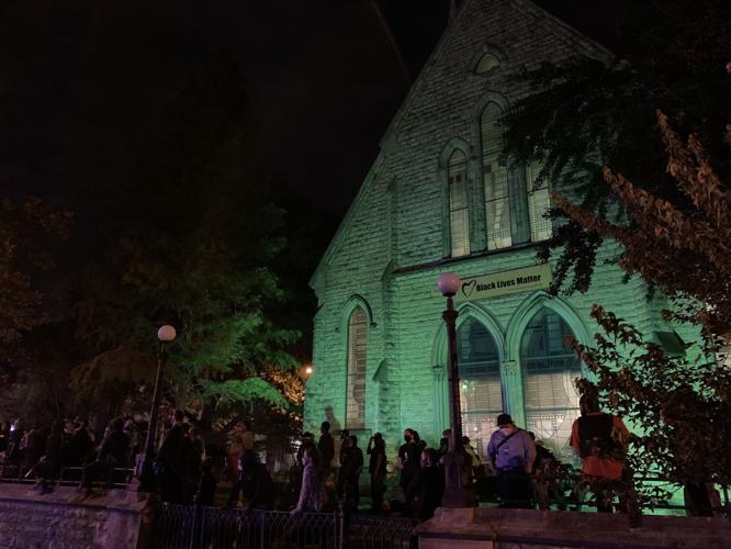 Protesters gather outside First Unitarian Church on 9/24/20