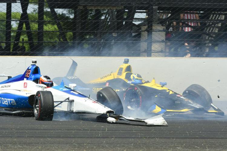 Felix Rosenqvist and Zach Veach collide