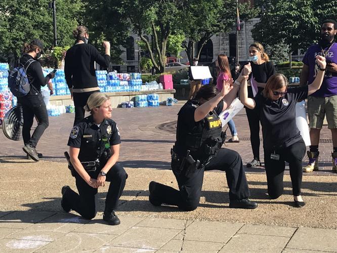 LMPD officers take a knee during protests 6-1-20