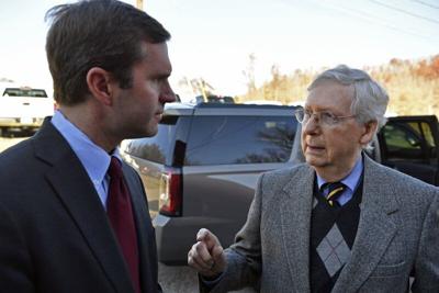Senate Majority Leader Mitch McConnell, R-Ky., right, speaks with then-Gov.-Elect Andy Beshear