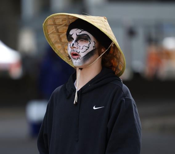boy with painted face and hat.JPG
