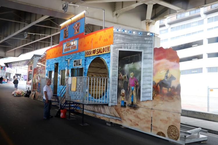 Crews set up booths along the Ohio River one day before Thunder Over Louisville 2023