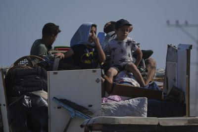 APTOPIX Palestinians evacuate Gaza City