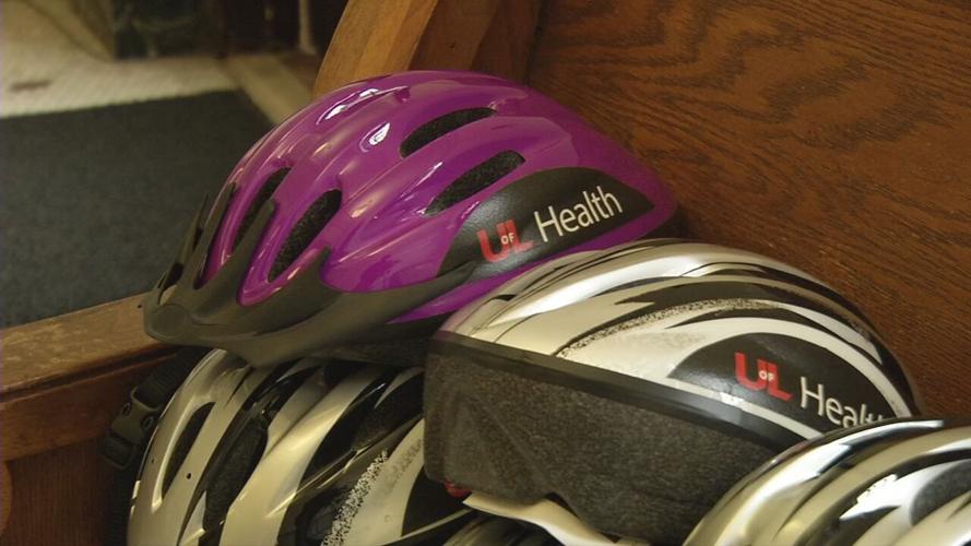 UofL Health bike helmet donation to KY Refugee Ministries.jpeg