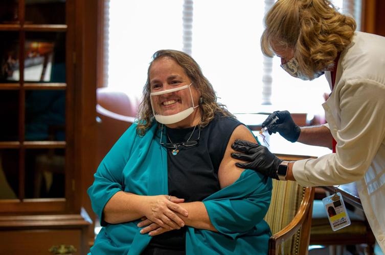 American Sign Language Interpreter Virginia Moore gets flu shot