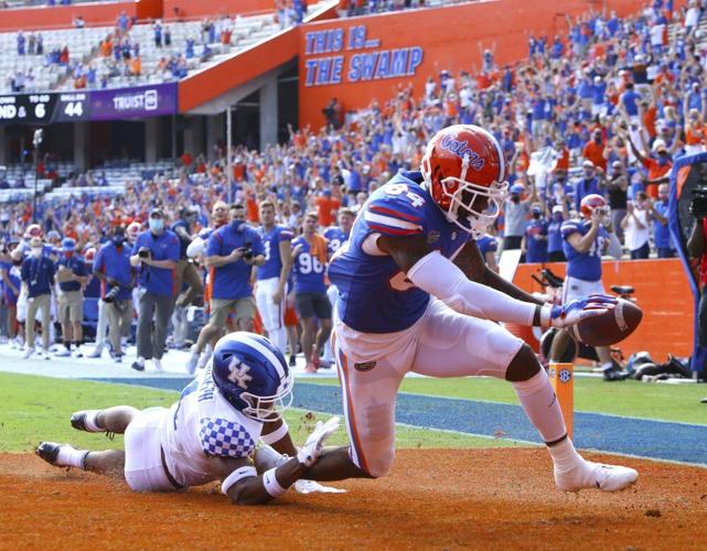 Florida tight end Kyle Pitts (84) scores a touchdown during an NCAA college football game against Kentucky