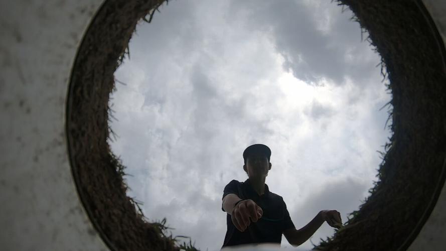 Happy Gilmore looks into putting hole