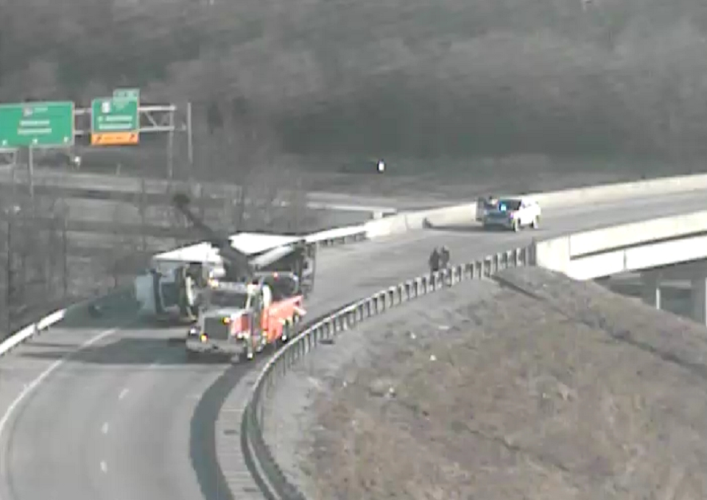 Overturned semi removal on I-64W ramp