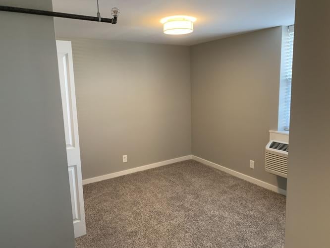A bedroom inside the Clarksville Lofts