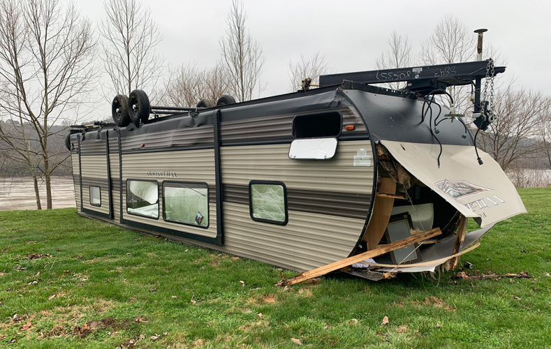 Overturned camper in Milton, Ky.