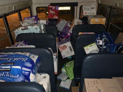 JCPS STUFF THE BUS.jpeg