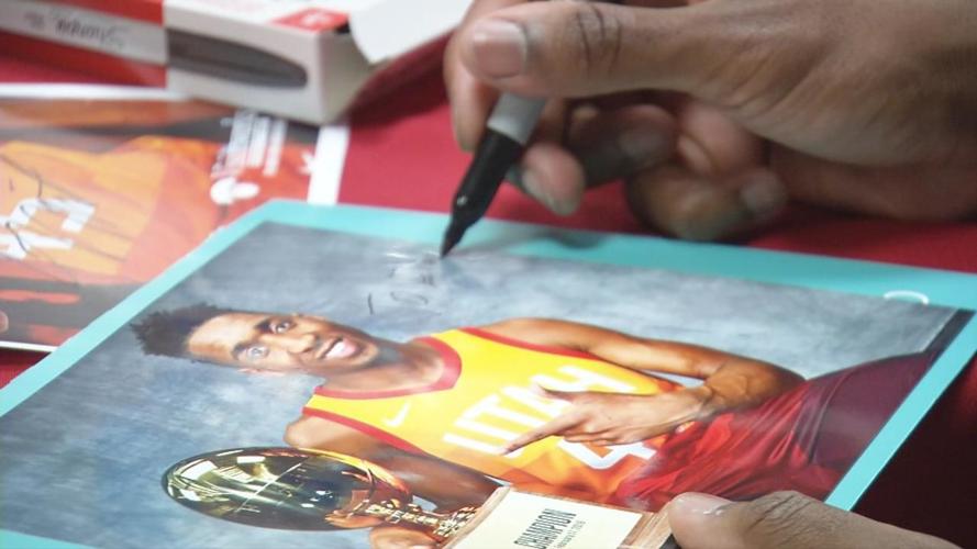 Donovan Mitchell signing picture