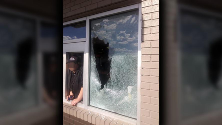 KFC window shot out by disgruntled customer