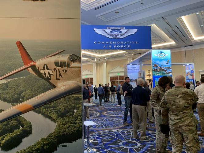 People gather at airshow convention