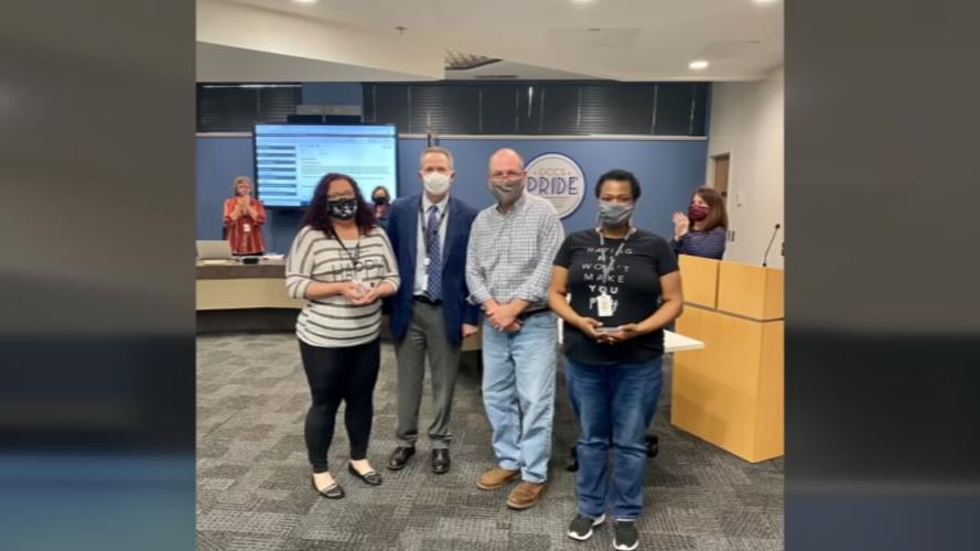 GCCS bus driver Jill Sluder and bus monitor Kendra Coleman honored by school district for saving student.jpeg